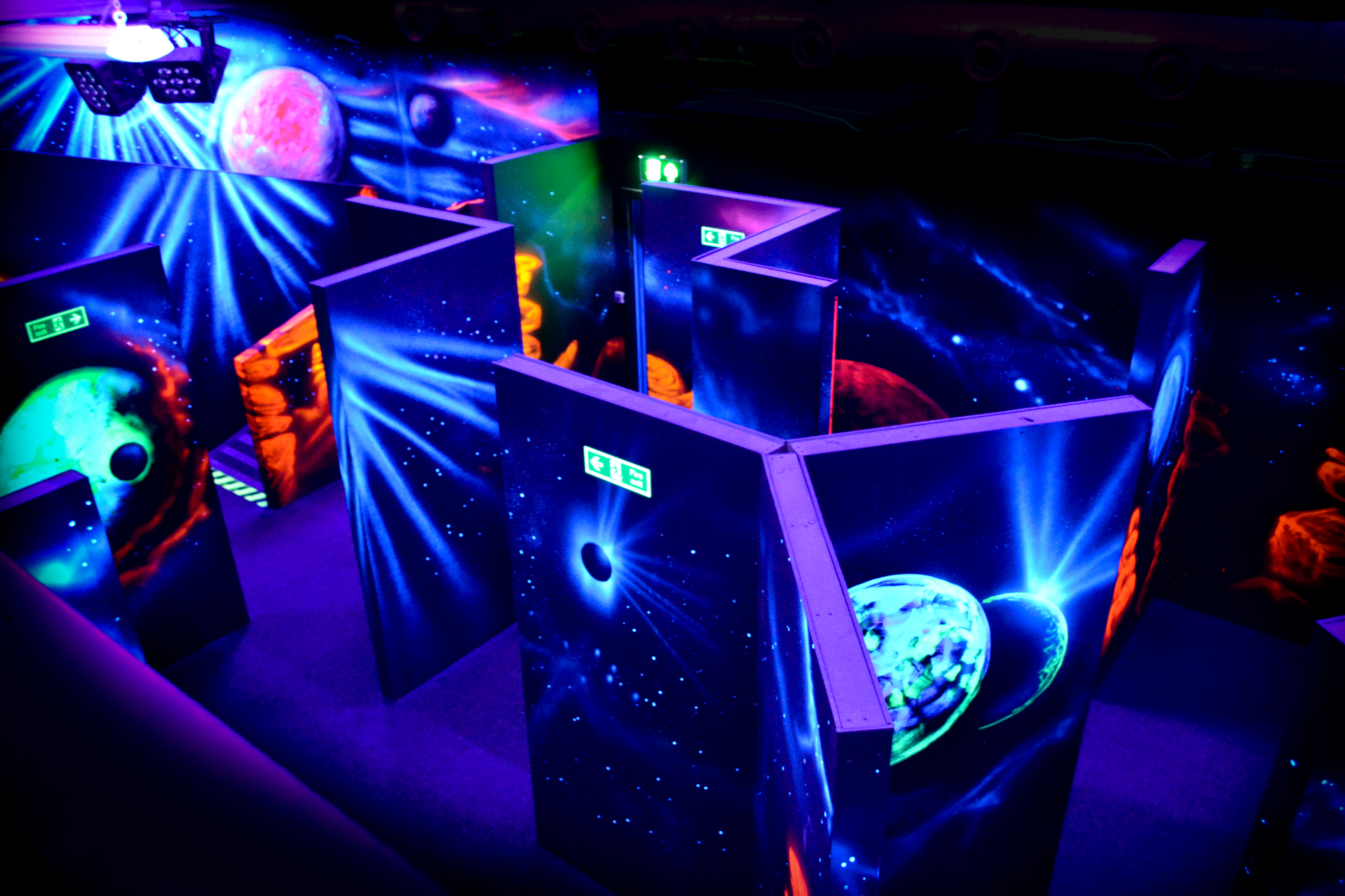 Neon lights and futuristic ambience suggesting a game arena